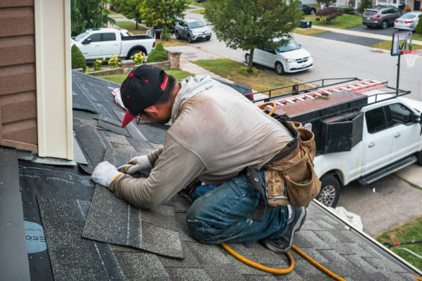 Professional Roofing technician working in Berkley, MA
